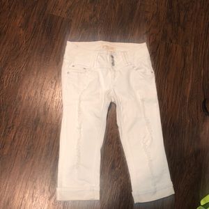 White ripped capris